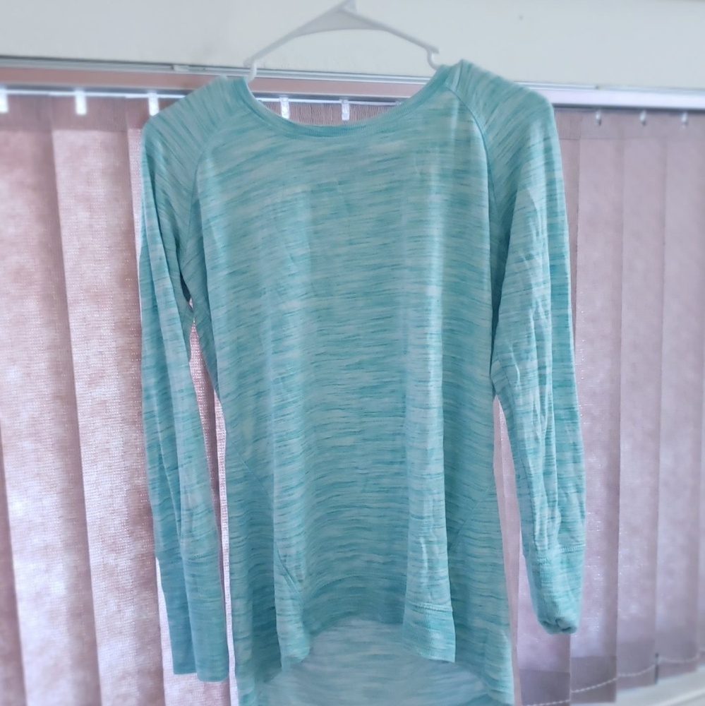 Blue long sleeved athletic top
